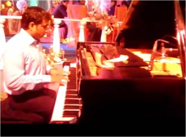 male piano player thane