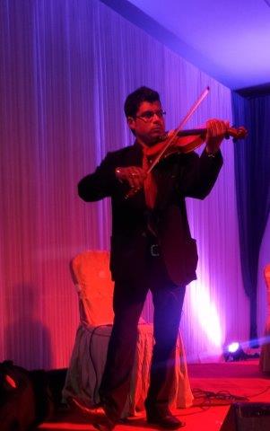 male solo musician thane